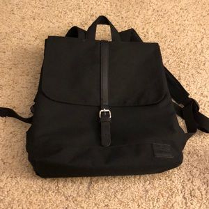 Black Johnny Urban backpack with laptop case area
